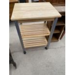 A MODERN KITCHEN TABLE/TROLLEY