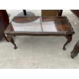 A MODERN MAHOGANY COFFEE TABLE ON CABRIOLE LEGS