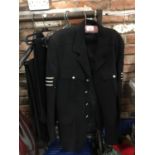 A POLICEMAN'S SERGEANT JACKET PLUS THREE PAIRS OF TROUSERS