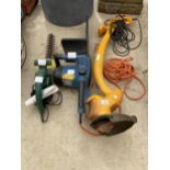 AN ELECTRIC HEDGE TRIMMER, AN ELECTRIC CHAINSAW AND A GARDEN STRIMMER