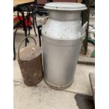 A GALVANISED MILK CHURN AND A FURTHER VINTAGE LIDDED BUCKET