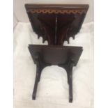 A MAHOGANY BRACKET CLOCK SHELF WITH PIERCED CIRCULAR RIM DECORATION AND GOTHIC STYLE DECORATIVE