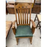 A REPRODUCTION OAK INLAID ROCKING CHAIR