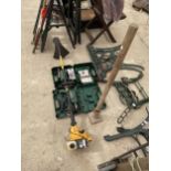 AN ASSORTMENT OF TOOLS TO INCLUDE A BOSCH JIGSAW A DRILL AND A PETROL ENGINE GRASS STRIMMER