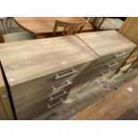 A PAIR OF MODERN OAK EFFECT BEDROOM CHESTS OF THREE DRAWERS, 31.5" WIDE EACH
