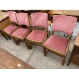 A SET OF FOUR OAK EARLY 20TH CENTURY DINING CHAIRS