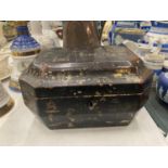 A CHINOISERIE DECORATED SARCOPHAGUS SHAPED BOX WITH ORIENTAL STYLING