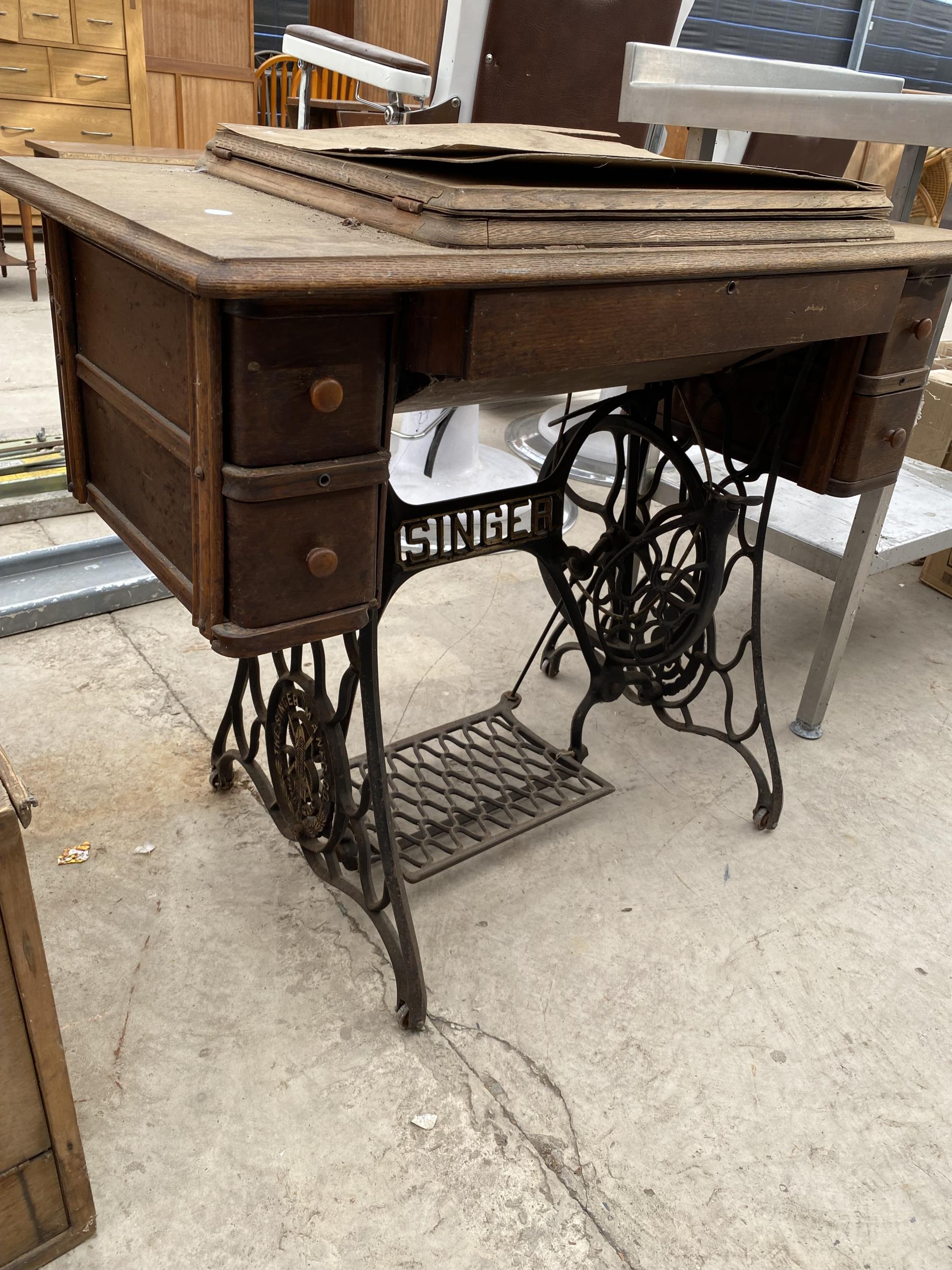 A VINTAGE SINGER SEWING MACHINE WITH CAST TREDDLE BASE - Image 2 of 5