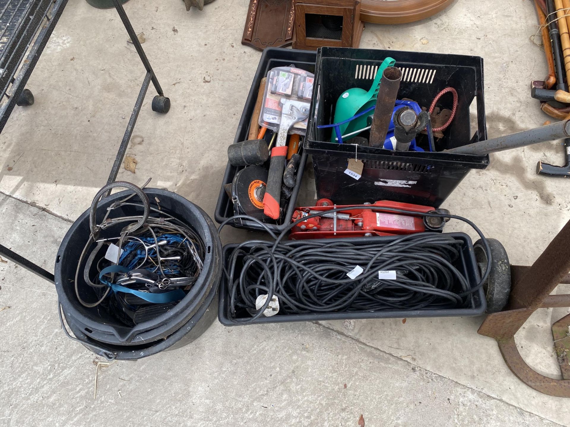 AN ASSORTMENT OF TOOLS TO INCLUDE A TROLLEY JACK, HORSE TACK AND A FOOT PUMP ETC