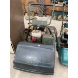 AN ATCO PETROL ENGINE LAWN MOWER COMPLETE WITH GRASS BOX