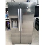 AN LG AMERICAN STYKE FRIDGE FREEZER WITH WATER DISPENSER