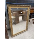 A MODERN GILT FRAMED WALL MIRROR, 34X24"