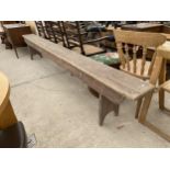 A VICTORIAN PINE BENCH, 10' LONG