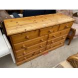 A MODERN PINE CHEST OF THREE SHORT AND SIX LONG DRAWERS, 52" WIDE