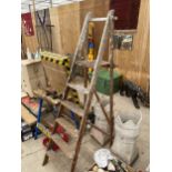 A VINTAGE FIVE RUNG WOODEN STEP LADDER