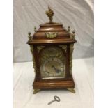 A 19TH CENTURY OAK CASED BRACKET CLOCK WITH FULL BRASS DIAL AND SILVER CHAPTER RING DECORATED WITH
