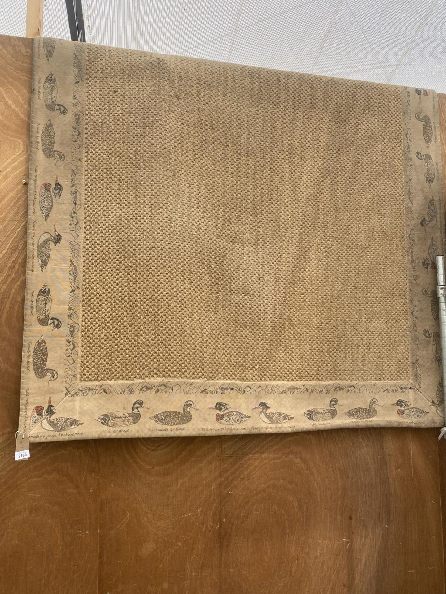 A MODERN HESSIAN STYLE RUG WITH DUCK DECORATION