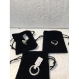 THREE SILVER 925 RINGS WITH CUBIC ZIRCONIA STONES AND EACH HAVE A PRESENTATION BAG