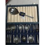 A VINTAGE BOXED SET OF DESSERT SPOONS, FORKS AND A SERVING SPOON WITH FLUTED BOWLS