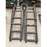 A PAIR POF METAL CAR RAMPS