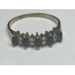 A 9 CARAT GOLD RING WITH FIVE IN LINE SAPPHIRES AND DIAMONDS SIZE O/P