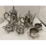 A SILVER PLATED COFFEE AND TEA SET TO INCLUDE COFFEE POT, TEAPOT, TWO LIDDED SUGAR BOWLS AND TWO