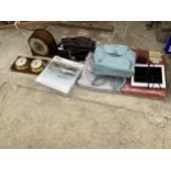 AN ASSORTMENT OF ITEMS TO INCLUDE A CLOCK, A BEROMETER AND A CASH TIN ETC