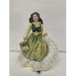 A ROYAL DOULTON "APRIL" FIGURINE HN3693 HAND MADE AND HAND DECORATED MODELLED BY NADA PEDLEY - 21 CM