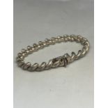 A MARKED SILVER BRACELET IN A TWIST DESIGN