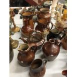 A QUANTITY OF EARTHENWARE JUGS TO INCLUDE ROYAL DOULTON, ETC