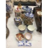 A COLLECTION OF ITEMS TO INCLUDE CHINA CUPS, BLUE AND WHITE LIDDED DISHES, ORIENTAL STYLE POTS,