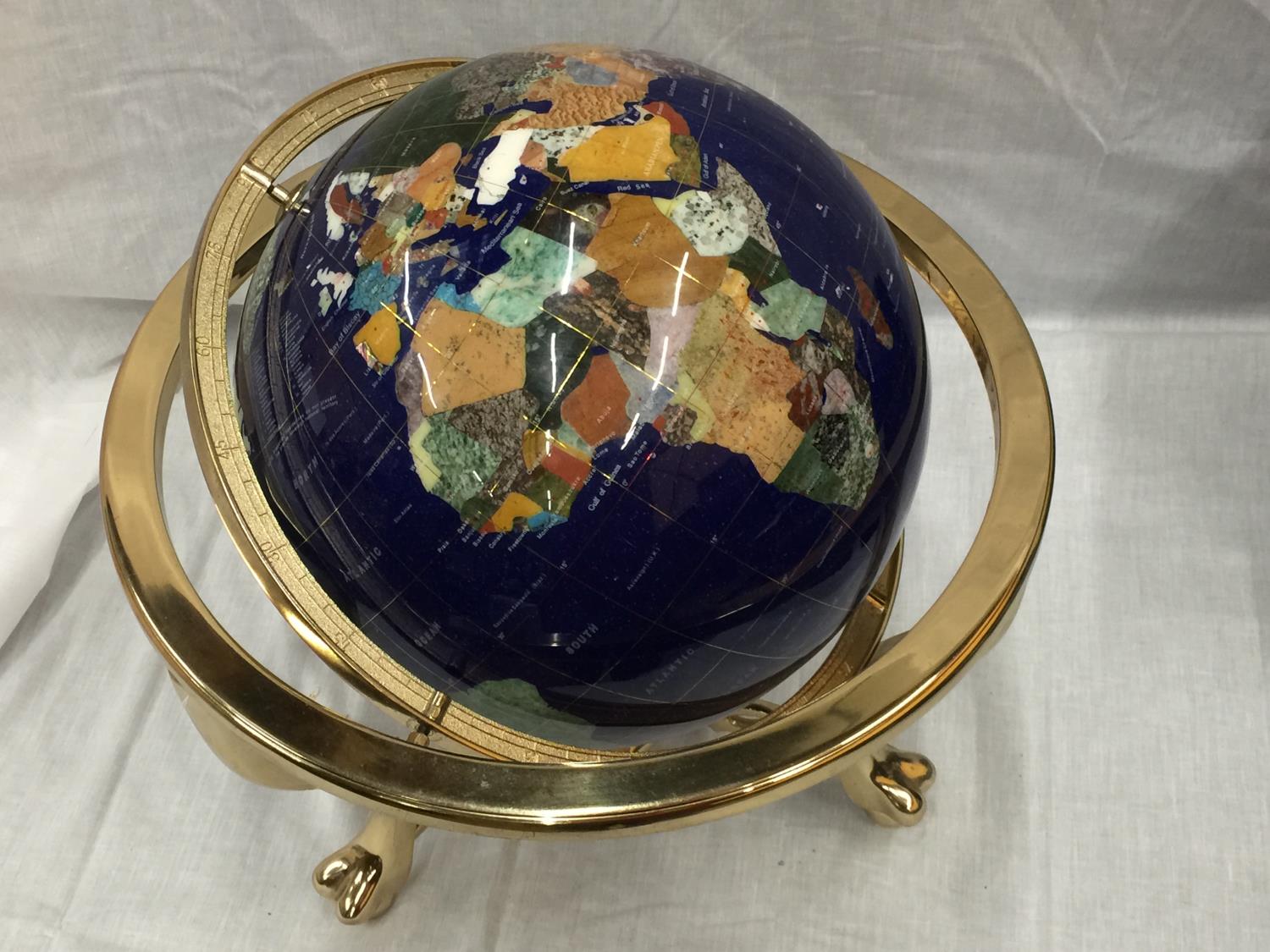 A GLOBE WITH MOTHER OF PEARL INLAYS ON BRASS ROTATING STAND H: 45CM - Image 2 of 8