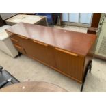 A RETRO TEAK SIDEBOARD, 67" WIDE ENCLOSING THREE CUPBOARDS AND THREE DRAWERS