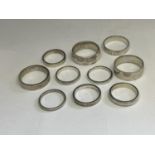 TEN WHITE METAL RINGS TESTED AS SILVER