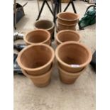 A COLLECTION OF THIRTEEN TERRACOTTA PLANT POTS