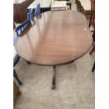 A REGENCY STYLE TWIN-PEDESTAL DINING TABLE