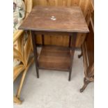 AN OAK EDWARDIAN TWO TIER CENTRE TABLE