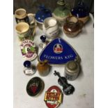 A QUANTITY OF BREWERY COLLECTABLES TO INCLUDE BEER PUMP FRONTS, GERMAN STEIN, LARGE FLOWERS KEG