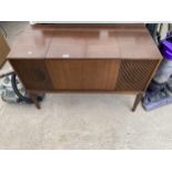 A RETRO TEAK RADIOGRAM WITH A GARRARD FOR BUSH RECORD DECK