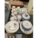 AN ASSORTMENT OF MIXED CERAMICS TO INCLUDE PLATES AND CUPS ETC
