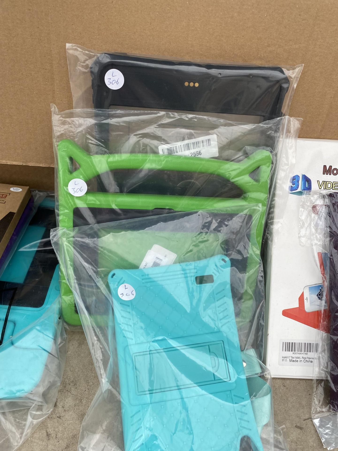 A LARGE ASSORTMENT OF PHONE AND TABLET CASES - Image 2 of 11