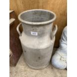 A MINITURE GALVANISED MILK CHURN