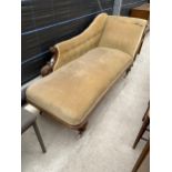 A VICTORIAN MAHOGANY CHAISE LONGUE ON TURNED LEGS