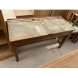 A MID 20TH CENTURY CHILDS DOUBLE SCHOOL DESK