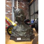 A RECONSTITUTED STONE 'BRONZED' BUST OF 'MOUSKA' HEIGHT 42CM, WIDTH 36CM