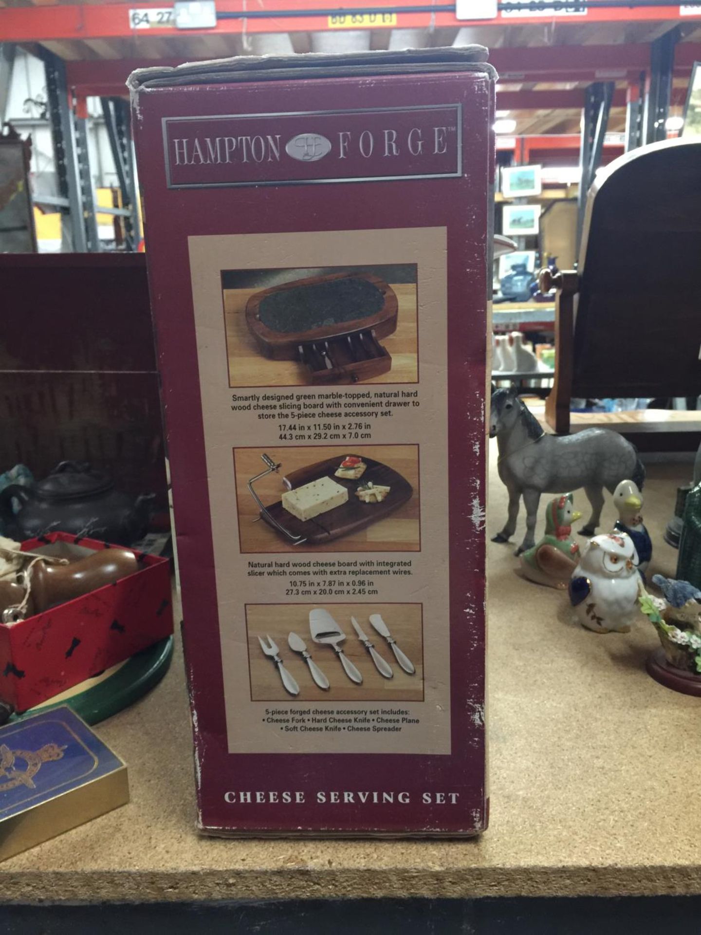 A HAMPTON FORGE SEVEN PIECE CHEESE SERVING SET IN BOX