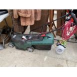A BOSCH POWER DRIVE ELECTRIC LAWN MOWER WITH GRASS BOX