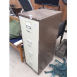 A FOUR DRAWER METAL FILING CABINET