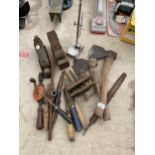 AN ASSORTMENT OF TOOLS TO INCLUDE A STANLEY WOOD PLANE, A BRACE DRILL AND TWO AXES BOTH BEARING