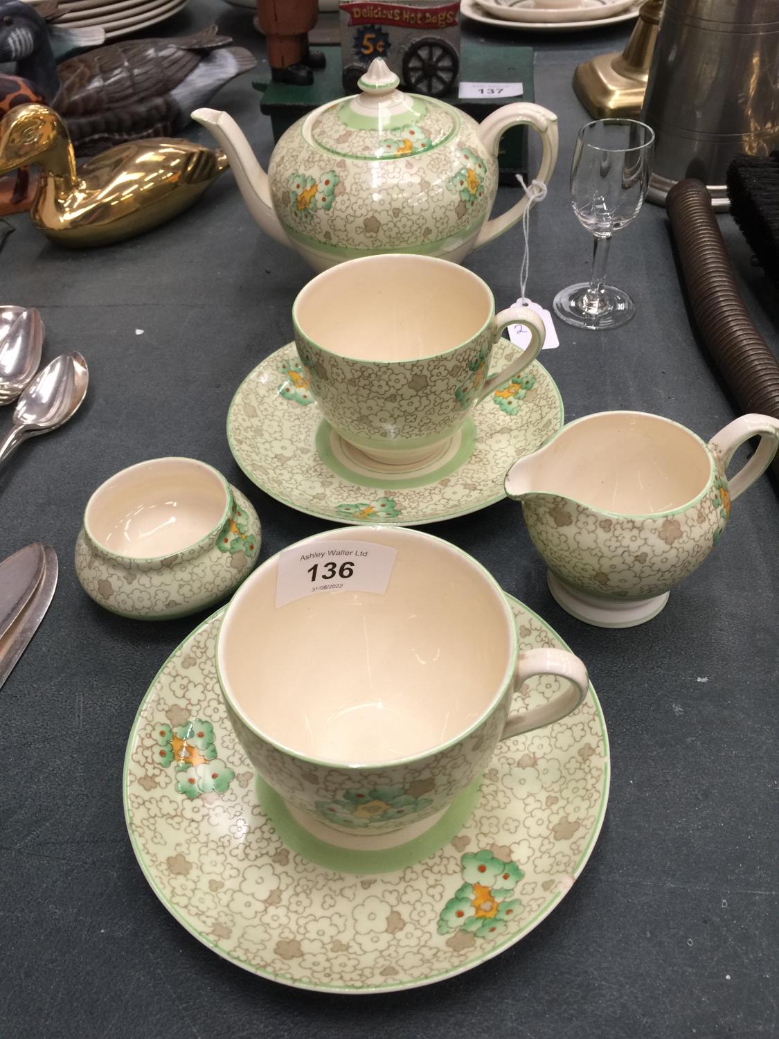 A CROWN DUCAL 'DELAMERE' TEA FOR TWO SET TO INCLUDE TEAPOT, CREAM JUG, SUGAR BOWL, CUPS AND